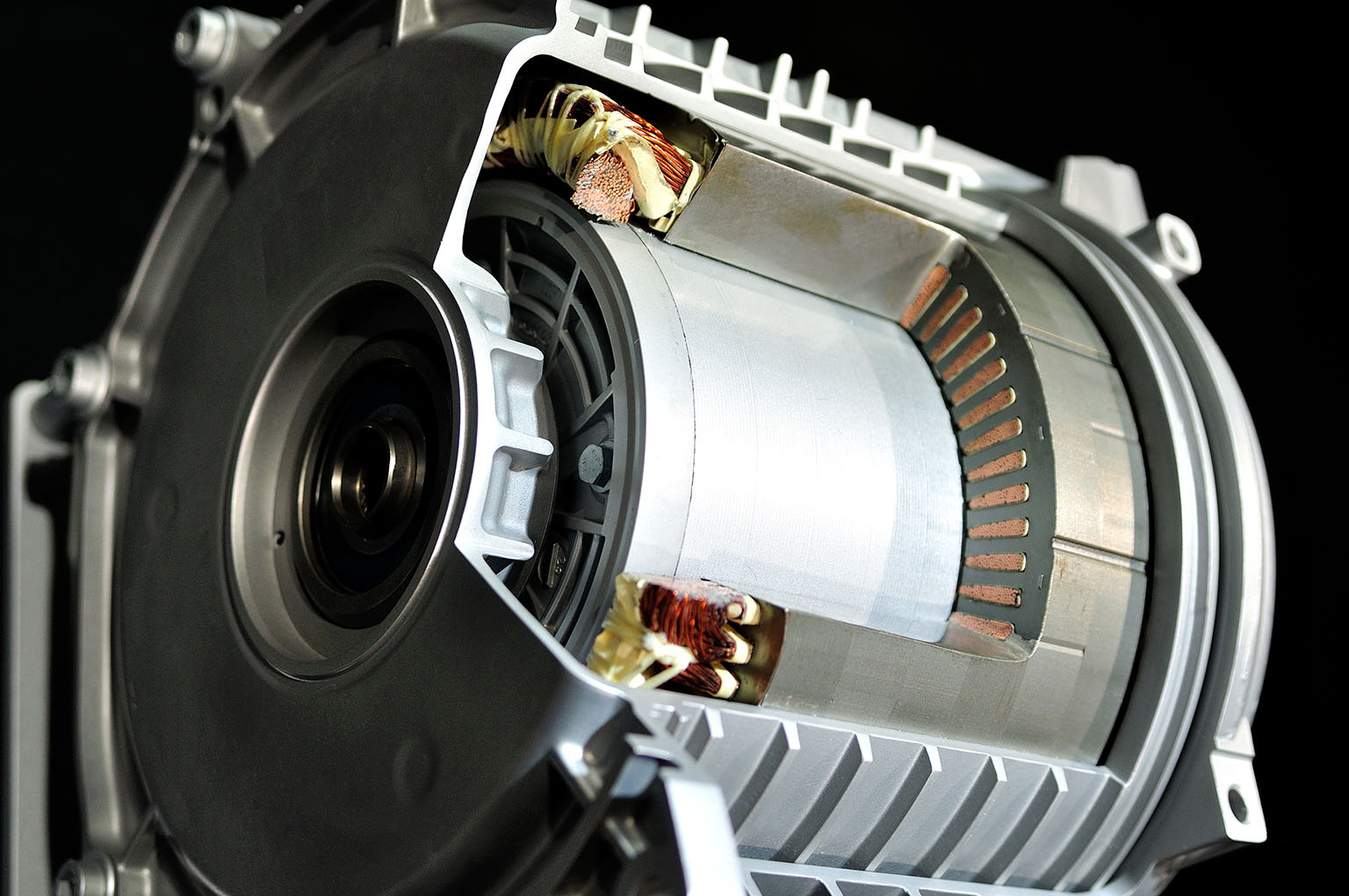 Integrated electric car drive module on black background