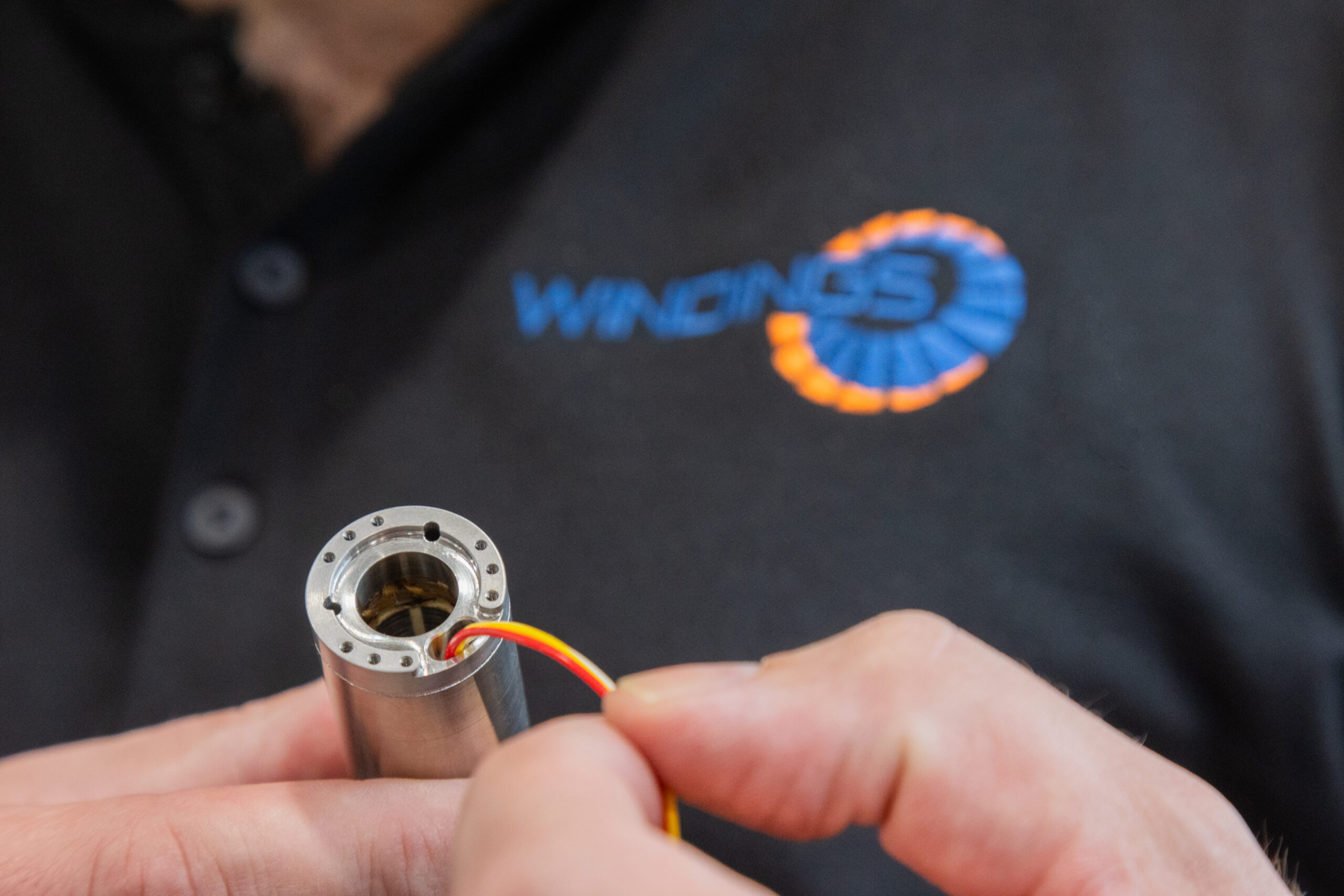 Windings' technicians assembling electromagnetic components